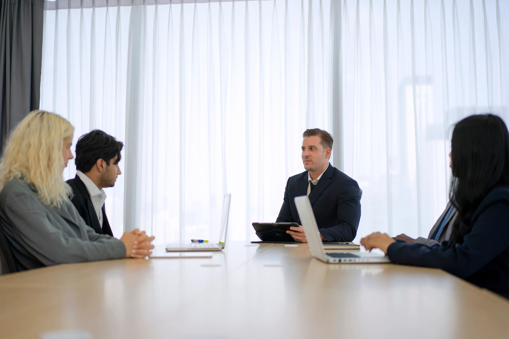 Business professionals meeting in a conference room
